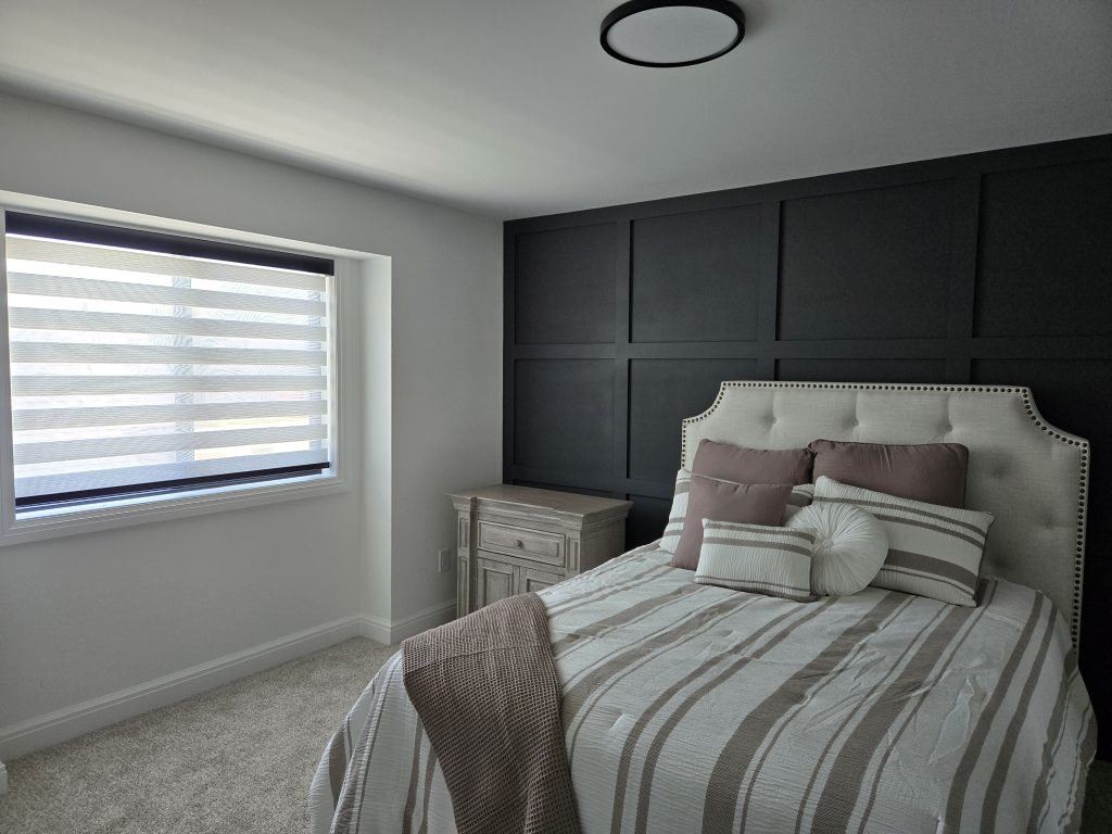 Zebra shades in bedroom