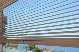 tan aluminum blinds
